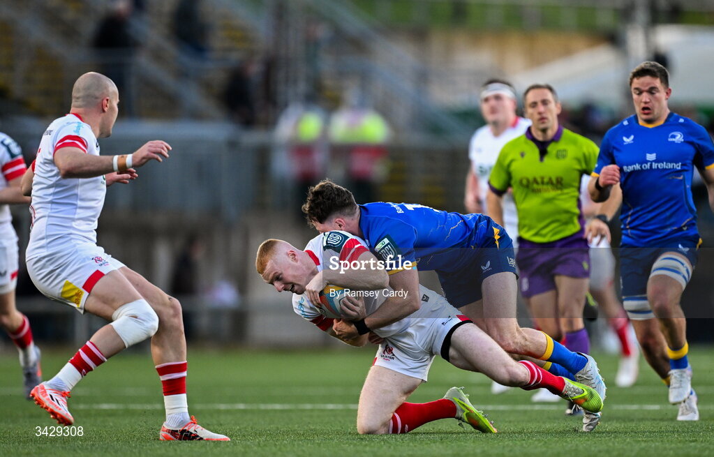 17 April 2026; Nathan Doak of Ulster is tackled by Hugo Keenan of Leinster during the United Rugby Championship match between Ulster and Leinster at Affidea Stadium in Belfast. Photo by Ramsey Cardy/Sportsfile