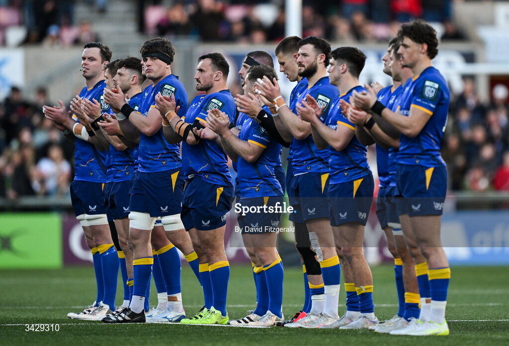 17 April 2026; Leinster players during a minutes applause for the late Christopher 'Chippie' Solomon before the United Rugby Championship match between Ulster and Leinster at Affidea Stadium in Belfast. Photo by David Fitzgerald/Sportsfile