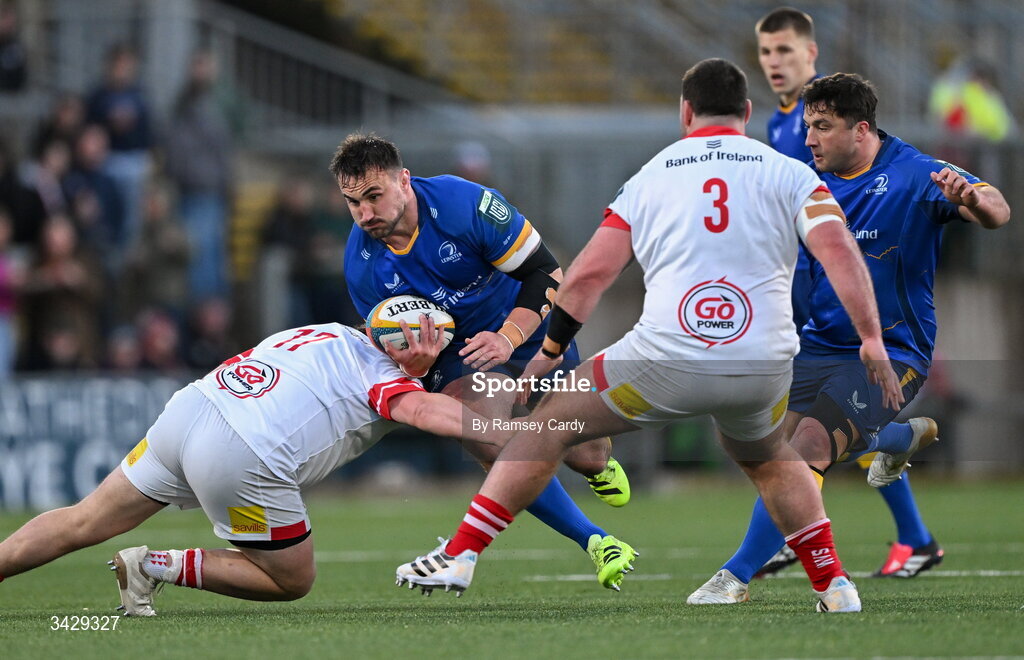 17 April 2026; Rónan Kelleher of Leinster is tackled by Sam Crean of Ulster during the United Rugby Championship match between Ulster and Leinster at Affidea Stadium in Belfast. Photo by Ramsey Cardy/Sportsfile