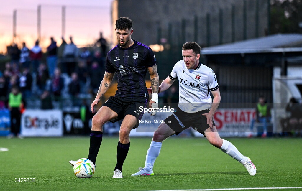 17 April 2026; Matty Wolfe of Galway United in action against Bobby Burns of Dundalk during the SSE Airtricity Men's Premier Division match between Dundalk and Galway United at Oriel Park in Dundalk, Louth. Photo by Ben McShane/Sportsfile