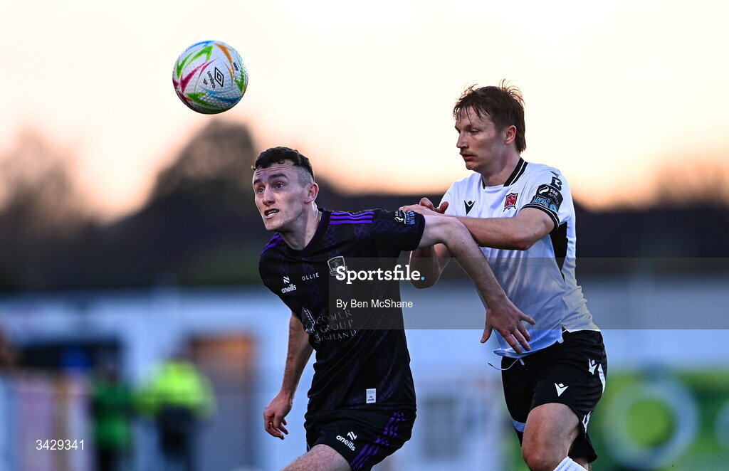 17 April 2026; Lee Devitt of Galway United in action against John Ross Wilson of Dundalk during the SSE Airtricity Men's Premier Division match between Dundalk and Galway United at Oriel Park in Dundalk, Louth. Photo by Ben McShane/Sportsfile