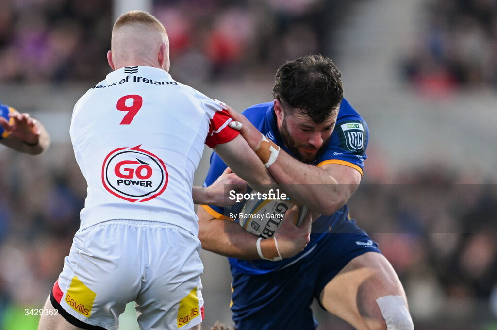 17 April 2026; Robbie Henshaw of Leinster is tackled by Nathan Doak of Ulster during the United Rugby Championship match between Ulster and Leinster at Affidea Stadium in Belfast. Photo by Ramsey Cardy/Sportsfile