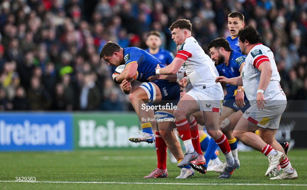 17 April 2026; Scott Penny of Leinster is tackled by Jack Murphy of Ulster during the United Rugby Championship match between Ulster and Leinster at Affidea Stadium in Belfast. Photo by Ramsey Cardy/Sportsfile