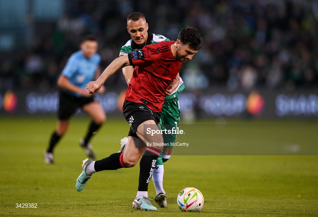 17 April 2026; Jordan Flores of Bohemians in action against Graham Burke of Shamrock Rovers during the SSE Airtricity Men's Premier Division match between Shamrock Rovers and Bohemians at Tallaght Stadium in Dublin. Photo by Stephen McCarthy/Sportsfile