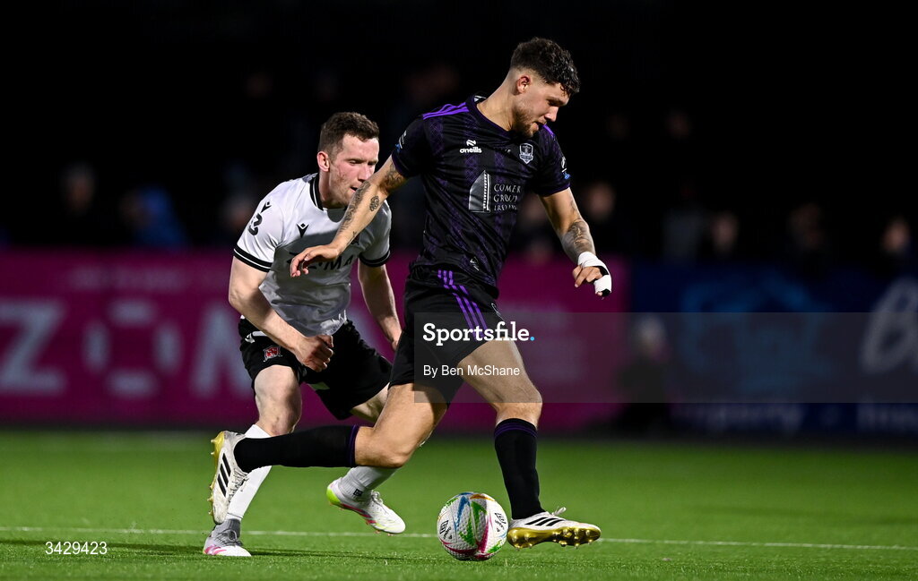 17 April 2026; Matty Wolfe of Galway United in action against Bobby Burns of Dundalk during the SSE Airtricity Men's Premier Division match between Dundalk and Galway United at Oriel Park in Dundalk, Louth. Photo by Ben McShane/Sportsfile