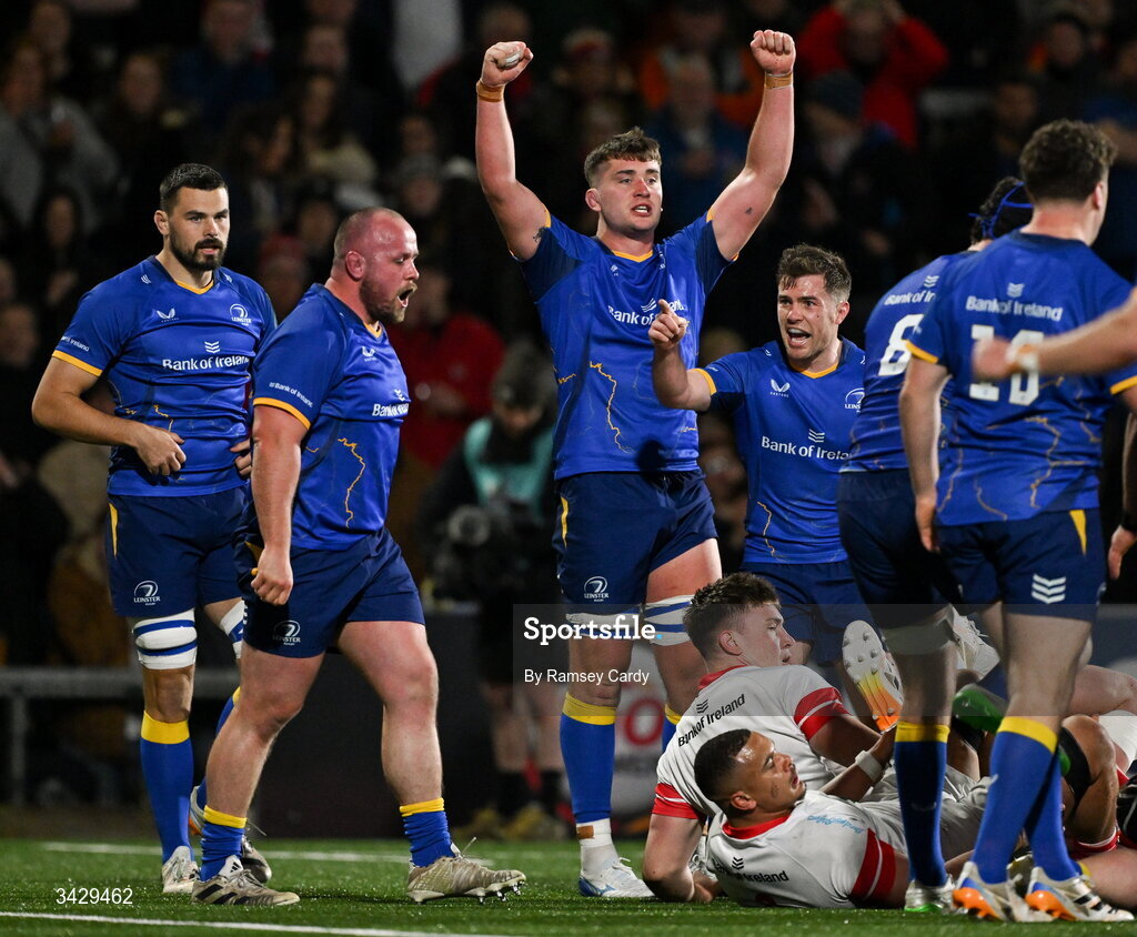 17 April 2026; Leinster players, from left, Max Deegan, Ed Byrne, Brian Deeny and Luke McGrath celebrate winning a penalty during the United Rugby Championship match between Ulster and Leinster at Affidea Stadium in Belfast. Photo by Ramsey Cardy/Sportsfile