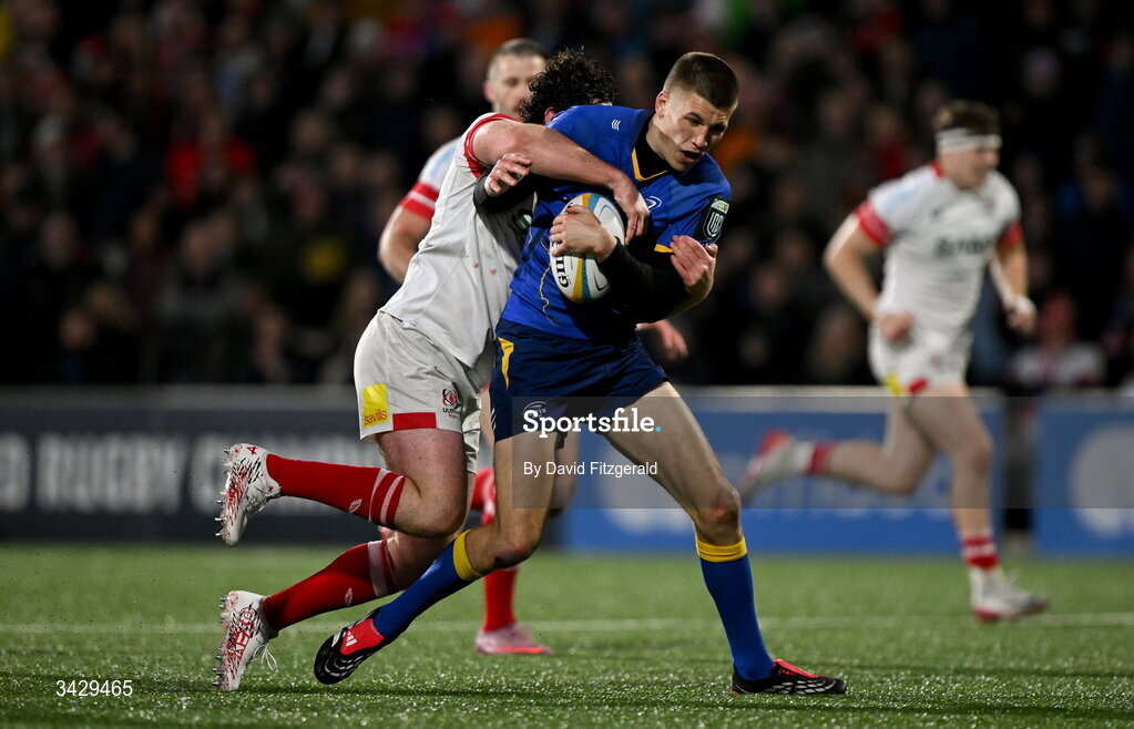 17 April 2026; Sam Prendergast of Leinster is tackled by Tom Stewart of Ulster during the United Rugby Championship match between Ulster and Leinster at Affidea Stadium in Belfast. Photo by David Fitzgerald/Sportsfile