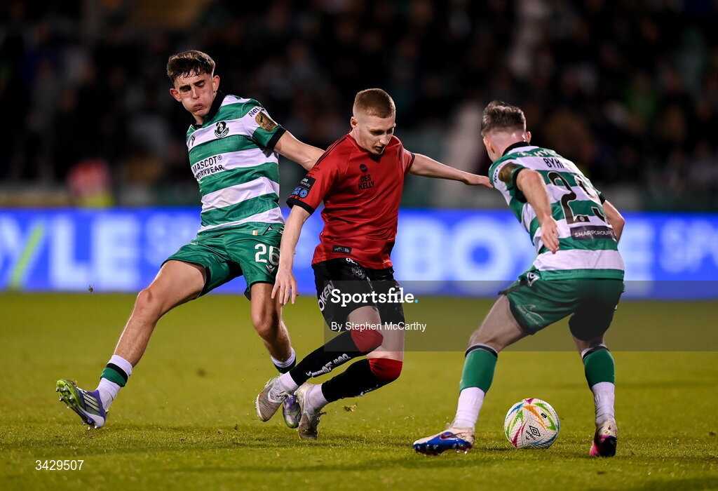 17 April 2026; Ross Tierney of Bohemians in action against John O'Sullivan, left, and Jack Byrne of Shamrock Rovers during the SSE Airtricity Men's Premier Division match between Shamrock Rovers and Bohemians at Tallaght Stadium in Dublin. Photo by Stephen McCarthy/Sportsfile
