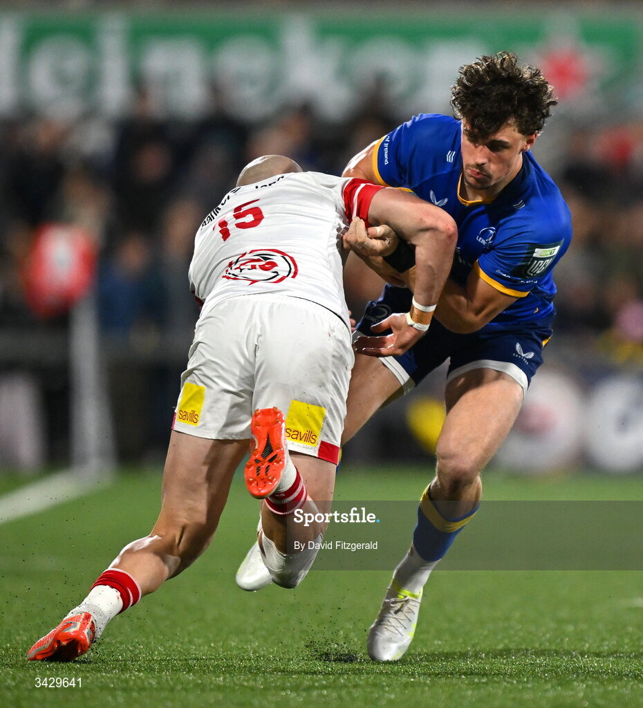 17 April 2026; Joshua Kenny of Leinster is tackled by Jacob Stockdale of Ulster during the United Rugby Championship match between Ulster and Leinster at Affidea Stadium in Belfast. Photo by David Fitzgerald/Sportsfile