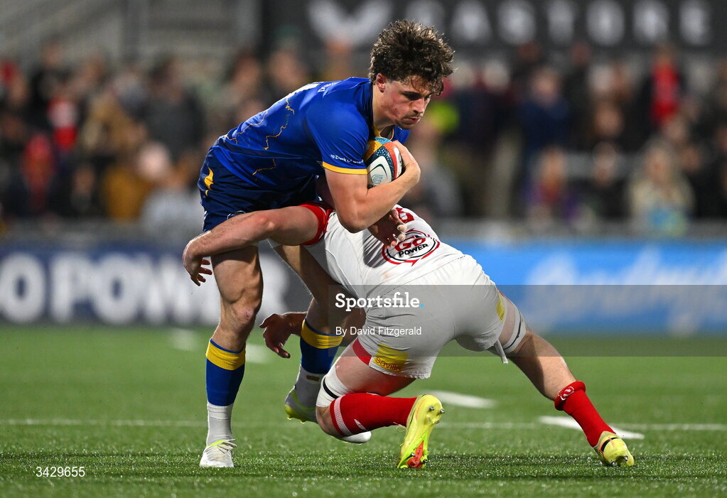 17 April 2026; Joshua Kenny of Leinster is tackled by David McCann of Ulster during the United Rugby Championship match between Ulster and Leinster at Affidea Stadium in Belfast. Photo by David Fitzgerald/Sportsfile