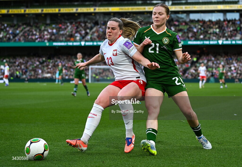 18 April 2026; Emily Murphy of Republic of Ireland in action against Adriana Achcinska of Poland during the 2027 FIFA Women’s World Cup Qualifier match between Republic of Ireland and Poland at the Aviva Stadium in Dublin. Photo by Stephen McCarthy/Sportsfile