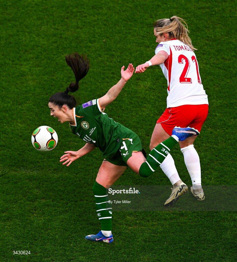 18 April 2026; Marissa Sheva of Republic of Ireland is tackled by Paulina Tomasiak of Poland during the 2027 FIFA Women’s World Cup Qualifier match between Republic of Ireland and Poland at the Aviva Stadium in Dublin. Photo by Tyler Miller/Sportsfile