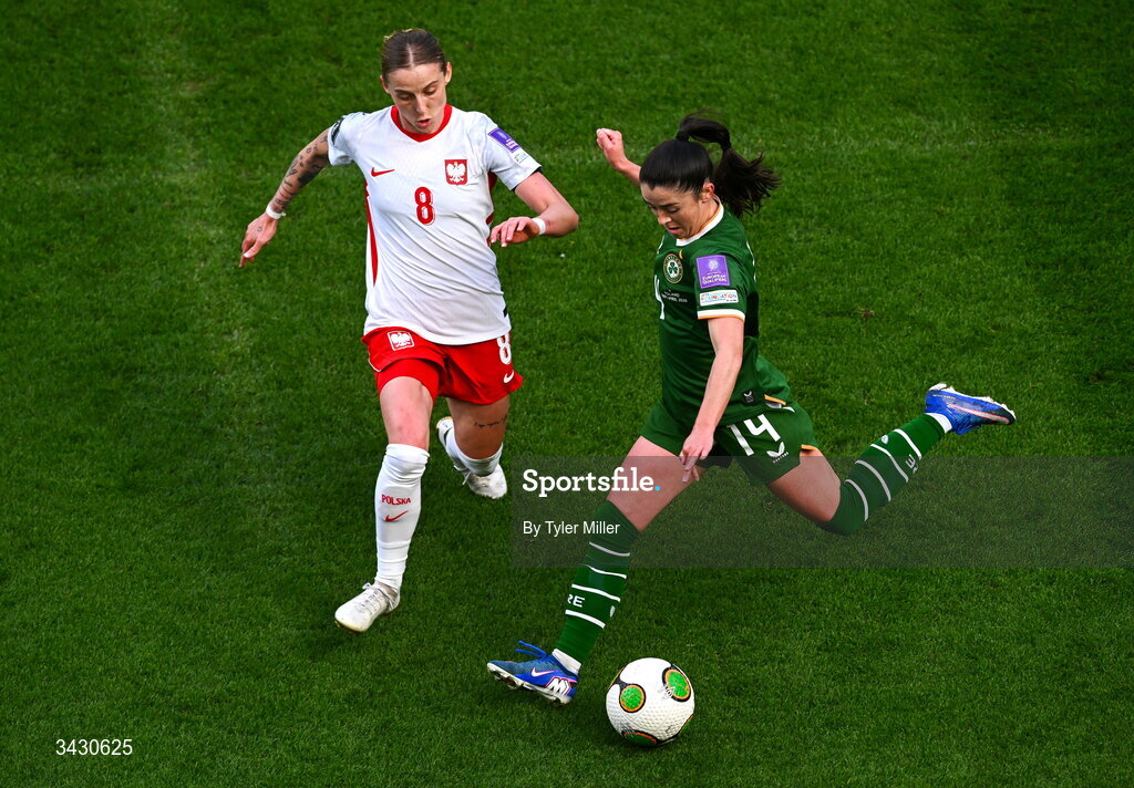 18 April 2026; Marissa Sheva of Republic of Ireland in action against Ewelina Kamczyk of Poland during the 2027 FIFA Women’s World Cup Qualifier match between Republic of Ireland and Poland at the Aviva Stadium in Dublin. Photo by Tyler Miller/Sportsfile