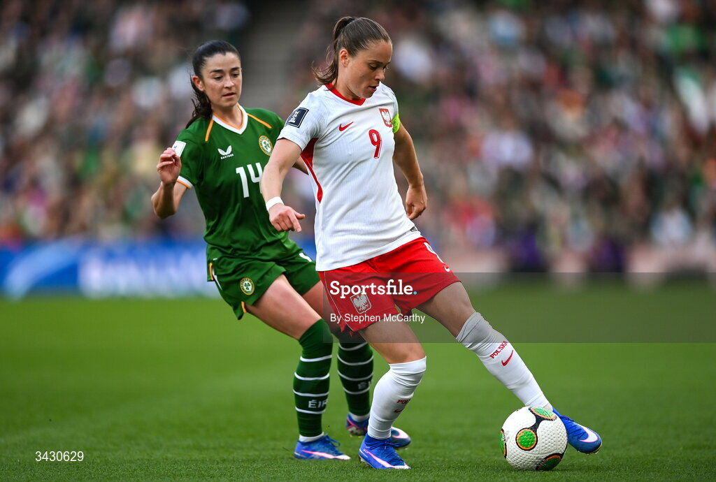 18 April 2026; Ewa Pajor of Poland in action against Marissa Sheva of Republic of Ireland during the 2027 FIFA Women’s World Cup Qualifier match between Republic of Ireland and Poland at the Aviva Stadium in Dublin. Photo by Stephen McCarthy/Sportsfile