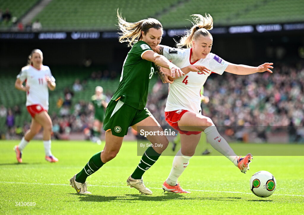 18 April 2026; Paulina Dudek of Poland in action against Kyra Carusa of Republic of Ireland during the 2027 FIFA Women’s World Cup Qualifier match between Republic of Ireland and Poland at the Aviva Stadium in Dublin. Photo by Seb Daly/Sportsfile