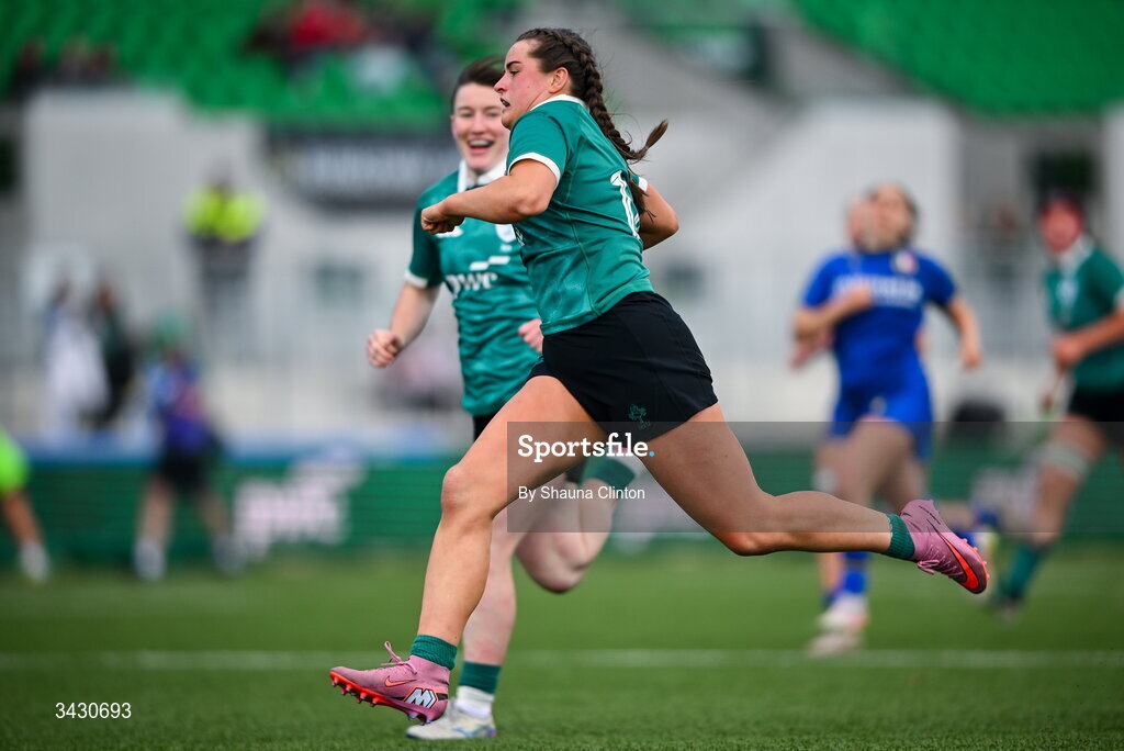 18 April 2026; Katie Corrigan of Ireland makes a break on her way to scoring her side's sixth try during the Women's U21 Six Nations Series match between Ireland and Italy at Dexcom Stadium in Galway. Photo by Shauna Clinton/Sportsfile