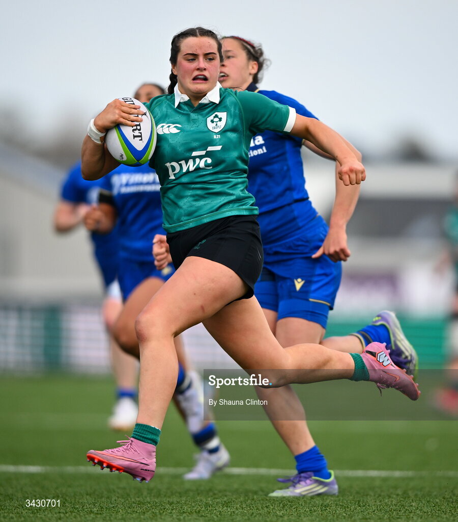 18 April 2026; Katie Corrigan of Ireland makes a break on her way to scoring her side's sixth try during the Women's U21 Six Nations Series match between Ireland and Italy at Dexcom Stadium in Galway. Photo by Shauna Clinton/Sportsfile