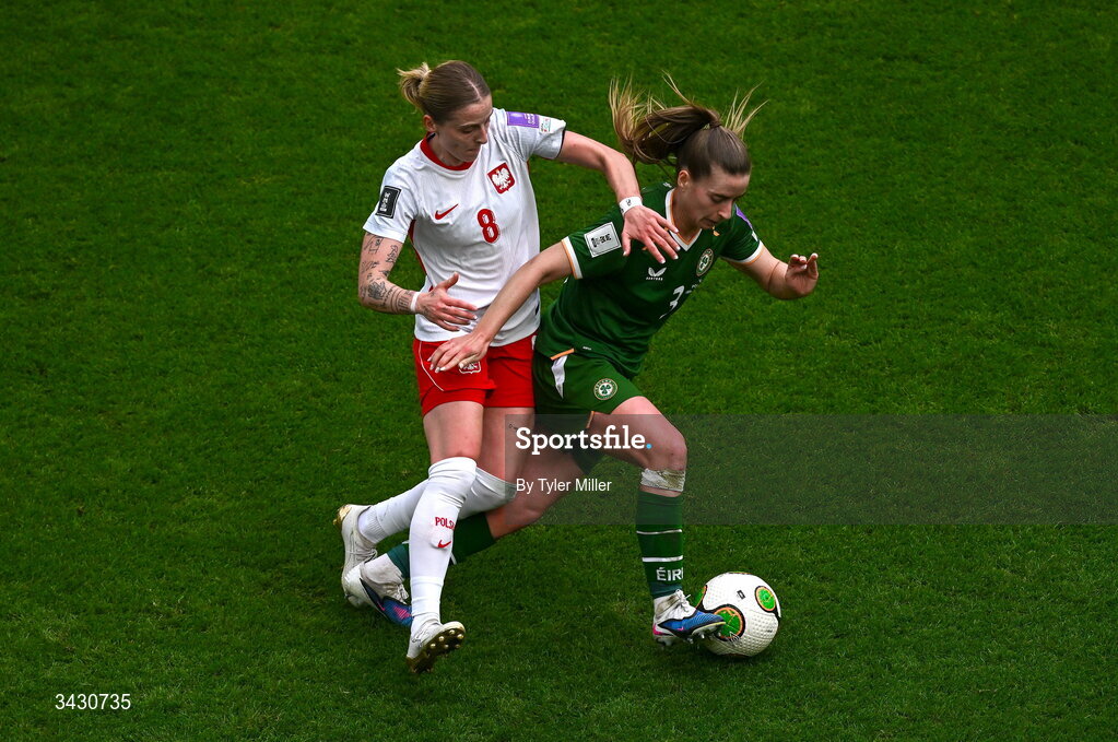 18 April 2026; Chloe Mustaki of Republic of Ireland in action against Ewelina Kamczyk of Poland during the 2027 FIFA Women’s World Cup Qualifier match between Republic of Ireland and Poland at the Aviva Stadium in Dublin. Photo by Tyler Miller/Sportsfile
