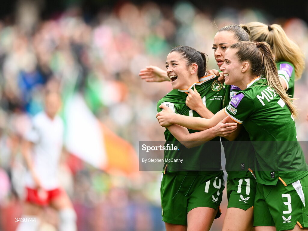 18 April 2026; Marissa Sheva of Republic of Ireland, second from left, celebrates with team-mates Katie McCabe, centre, and Chloe Mustaki after scoring their side's first goal during the 2027 FIFA Women’s World Cup Qualifier match between Republic of Ireland and Poland at the Aviva Stadium in Dublin. Photo by Stephen McCarthy/Sportsfile