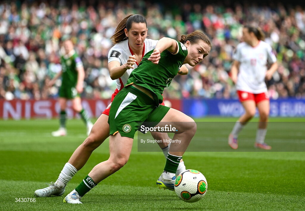 18 April 2026; Emily Murphy of Republic of Ireland in action against Wiktoria Zieniewicz of Poland during the 2027 FIFA Women’s World Cup Qualifier match between Republic of Ireland and Poland at the Aviva Stadium in Dublin. Photo by Stephen McCarthy/Sportsfile