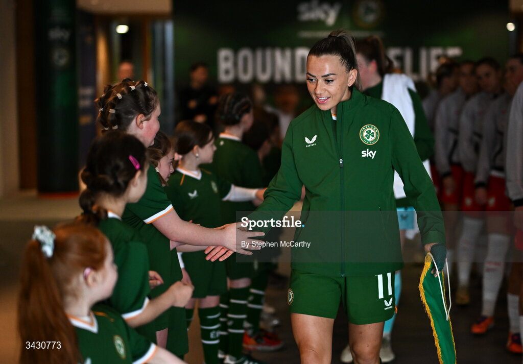 18 April 2026; Katie McCabe of Republic of Ireland with mascots before the 2027 FIFA Women’s World Cup Qualifier match between Republic of Ireland and Poland at the Aviva Stadium in Dublin. Photo by Stephen McCarthy/Sportsfile