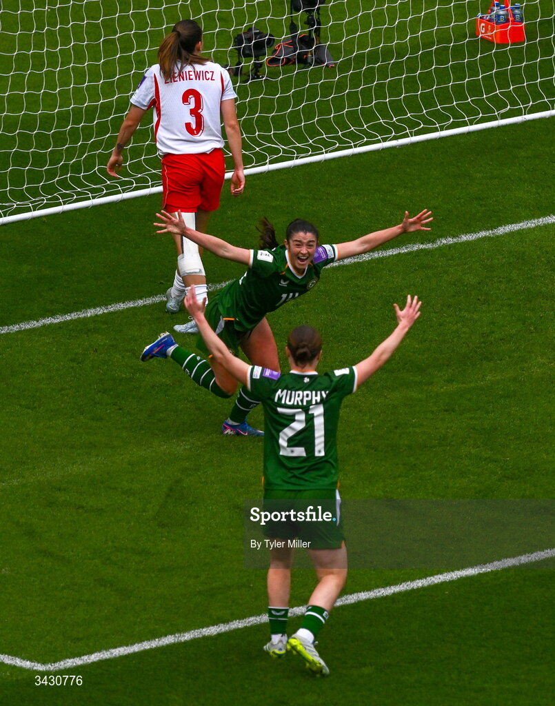 18 April 2026; Marissa Sheva of Republic of Ireland, top, celebrates with team-mate Emily Murphy after scoring their side's first goal during the 2027 FIFA Women’s World Cup Qualifier match between Republic of Ireland and Poland at the Aviva Stadium in Dublin. Photo by Tyler Miller/Sportsfile
