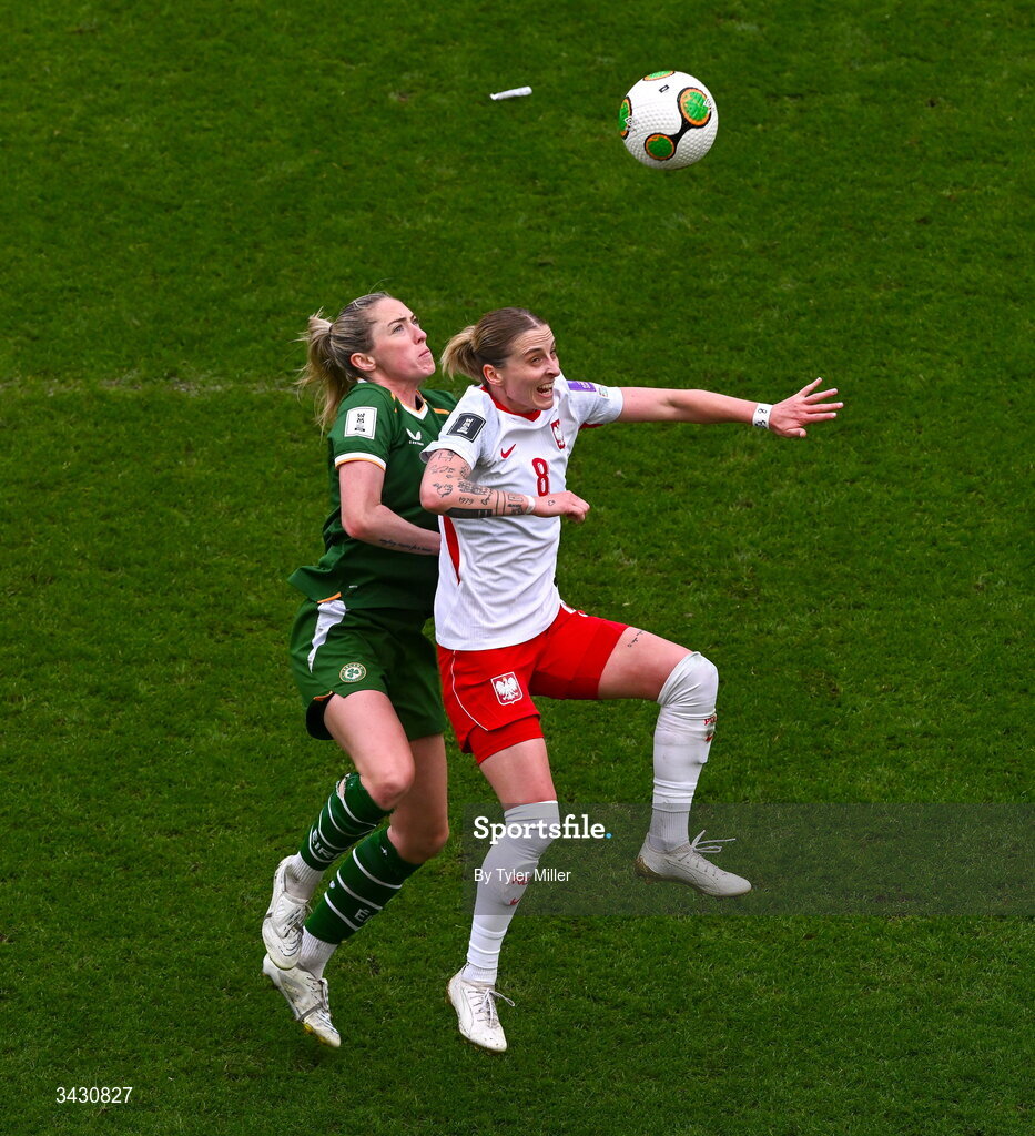 18 April 2026; Ewelina Kamczyk of Poland in action against Megan Connolly of Republic of Ireland during the 2027 FIFA Women’s World Cup Qualifier match between Republic of Ireland and Poland at the Aviva Stadium in Dublin. Photo by Tyler Miller/Sportsfile