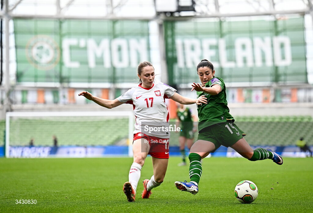 18 April 2026; Marissa Sheva of Republic of Ireland in action against Gabriela Grzybowska of Poland during the 2027 FIFA Women’s World Cup Qualifier match between Republic of Ireland and Poland at the Aviva Stadium in Dublin. Photo by Seb Daly/Sportsfile