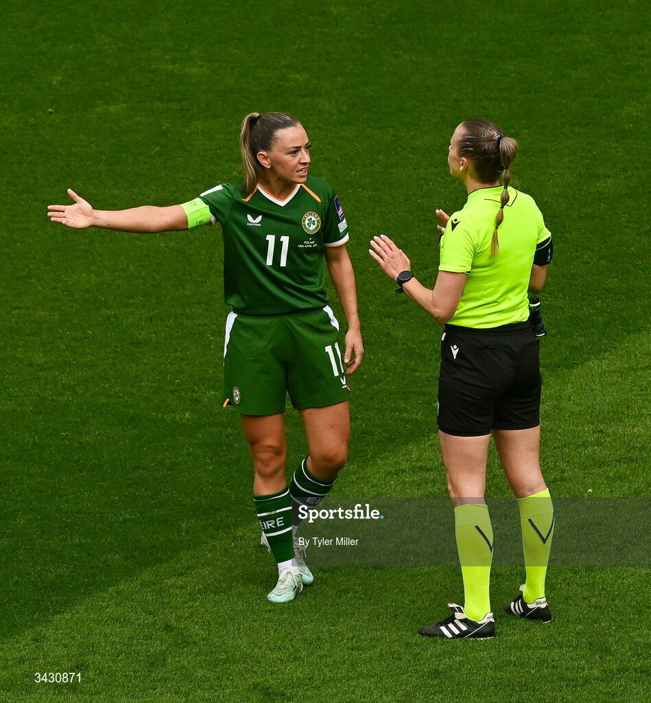18 April 2026; Katie McCabe of Republic of Ireland and referee Aleksandra Cesen during the 2027 FIFA Women’s World Cup Qualifier match between Republic of Ireland and Poland at the Aviva Stadium in Dublin. Photo by Tyler Miller/Sportsfile