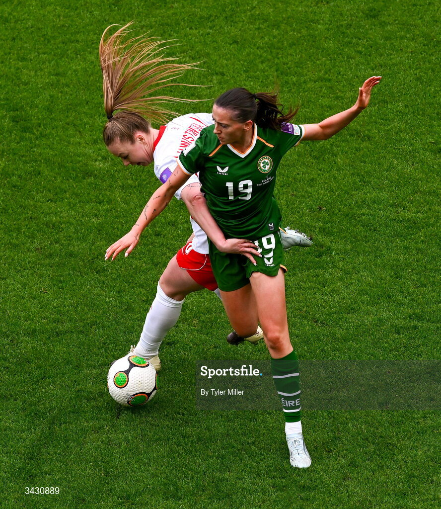 18 April 2026; Abbie Larkin of Republic of Ireland in action against Weronika Zawistowska of Poland during the 2027 FIFA Women’s World Cup Qualifier match between Republic of Ireland and Poland at the Aviva Stadium in Dublin. Photo by Tyler Miller/Sportsfile