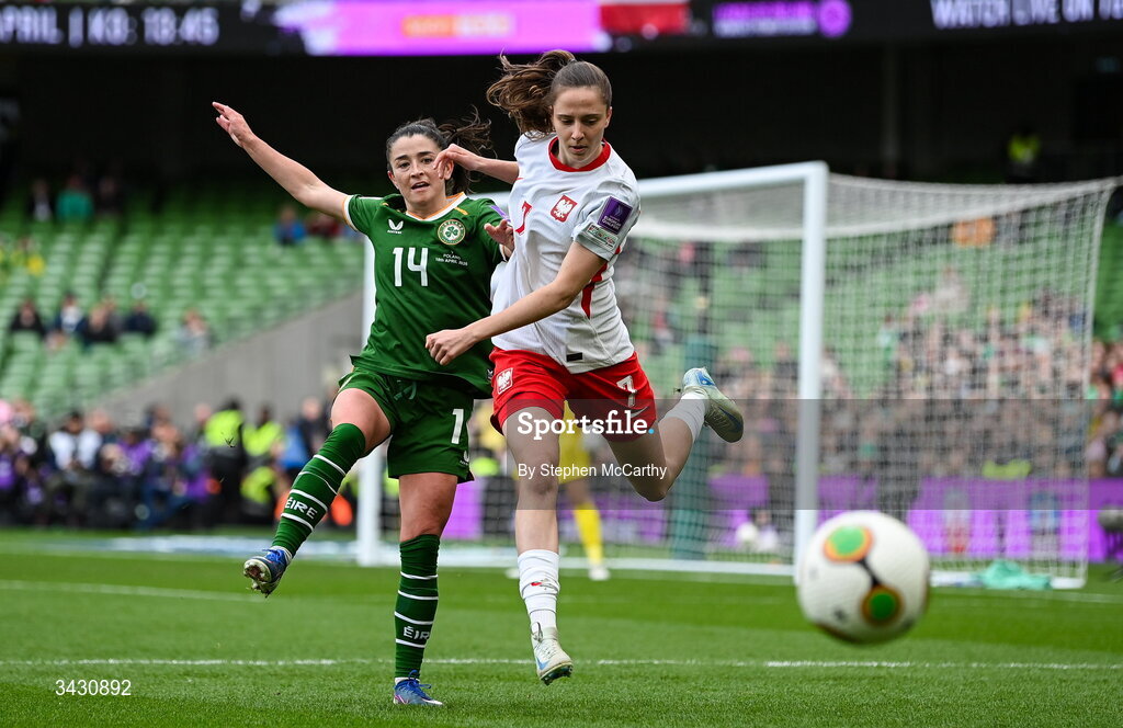 18 April 2026; Marissa Sheva of Republic of Ireland in action against Patrycja Sarapata of Poland during the 2027 FIFA Women’s World Cup Qualifier match between Republic of Ireland and Poland at the Aviva Stadium in Dublin. Photo by Stephen McCarthy/Sportsfile