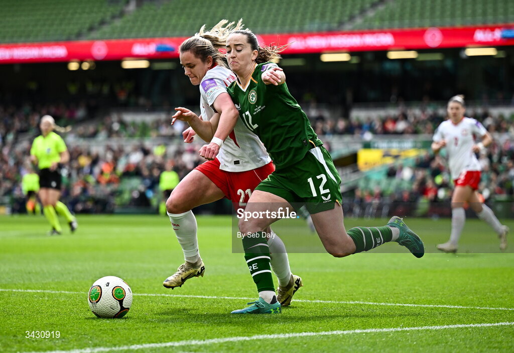 18 April 2026; Anna Patten of Republic of Ireland in action against Paulina Tomasiak of Poland during the 2027 FIFA Women’s World Cup Qualifier match between Republic of Ireland and Poland at the Aviva Stadium in Dublin. Photo by Seb Daly/Sportsfile