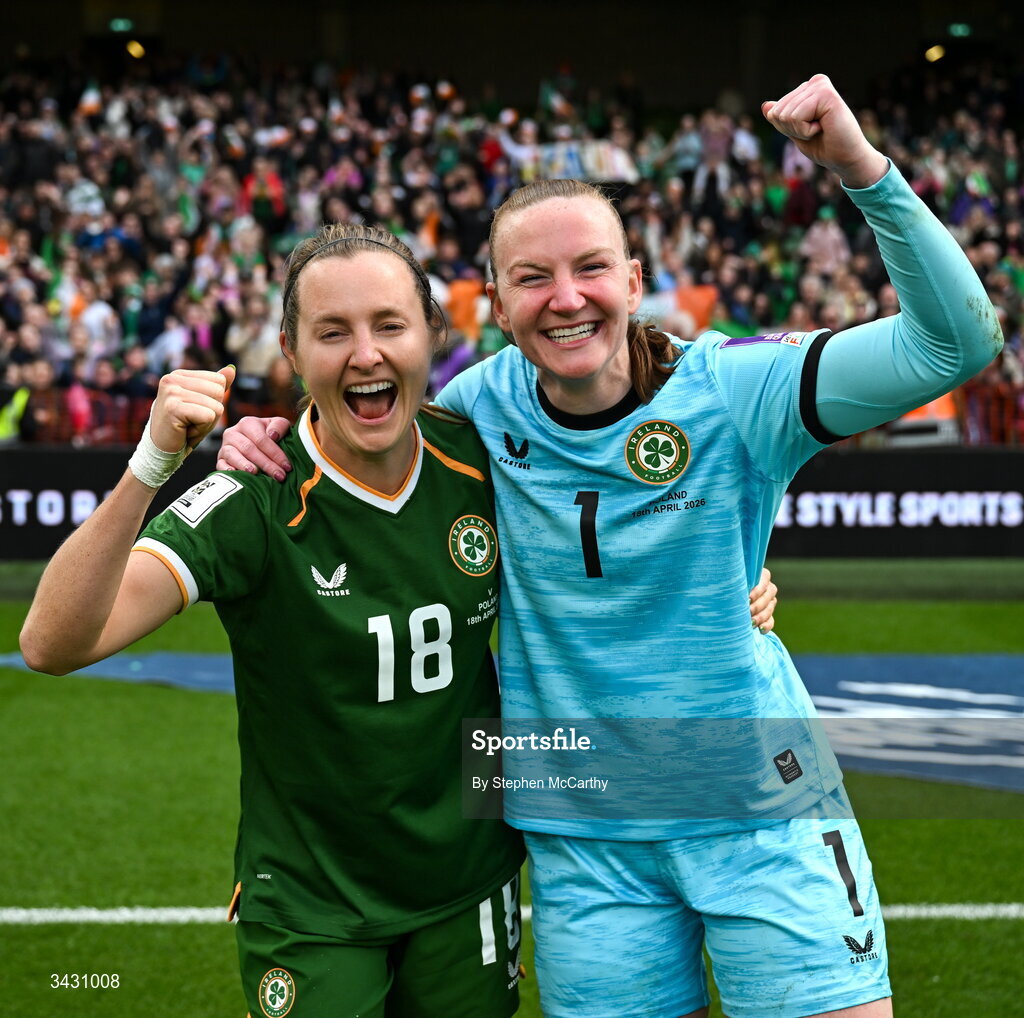 18 April 2026; Kyra Carusa, left, and Republic of Ireland goalkeeper Courtney Brosnan celebrate after the 2027 FIFA Women’s World Cup Qualifier match between Republic of Ireland and Poland at the Aviva Stadium in Dublin. Photo by Stephen McCarthy/Sportsfile