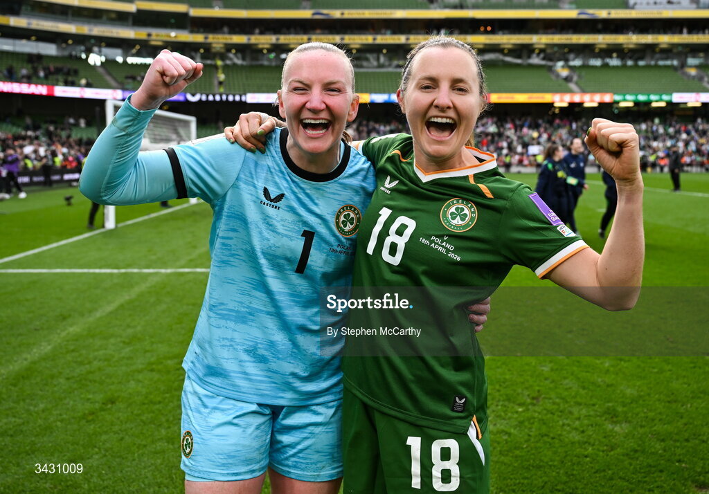 18 April 2026; Kyra Carusa, right, and Republic of Ireland goalkeeper Courtney Brosnan celebrate after the 2027 FIFA Women’s World Cup Qualifier match between Republic of Ireland and Poland at the Aviva Stadium in Dublin. Photo by Stephen McCarthy/Sportsfile
