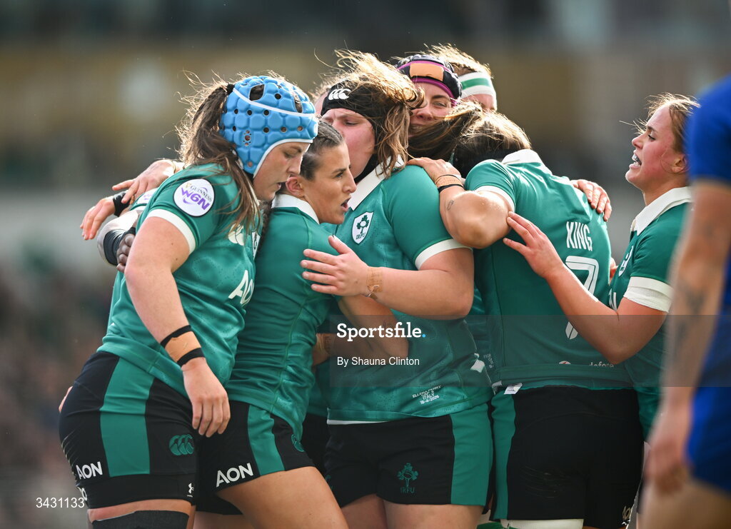 18 April 2026; Emily Lane of Ireland, centre, celebrates with team-mates after scoring her side's first try during the Women's Six Nations Rugby Championship match between Ireland and Italy at Dexcom Stadium in Galway. Photo by Shauna Clinton/Sportsfile