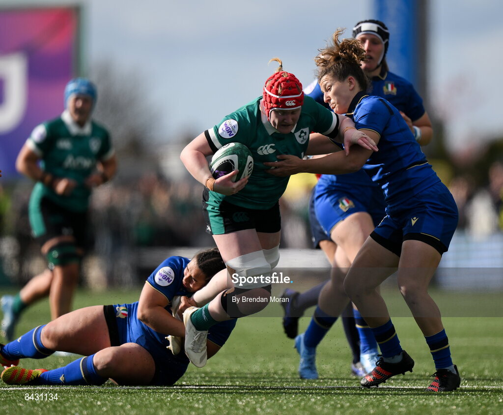 18 April 2026; Aoife Wafer of Ireland is tackled by Vittoria Vecchini and Aura Muzzo of Italy during the Women's Six Nations Rugby Championship match between Ireland and Italy at Dexcom Stadium in Galway. Photo by Brendan Moran/Sportsfile