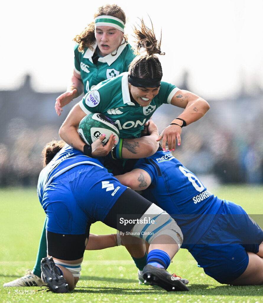 18 April 2026; Erin King of Ireland is tackled by Elettra Costantini, left, and Francesca Sgorbini of Italy during the Women's Six Nations Rugby Championship match between Ireland and Italy at Dexcom Stadium in Galway. Photo by Shauna Clinton/Sportsfile