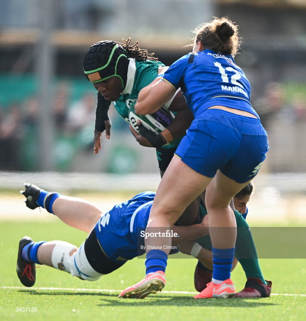 18 April 2026; Linda Djougang of Ireland is tackled by Elettra Costantini, left, and Sara Mannini of Italy during the Women's Six Nations Rugby Championship match between Ireland and Italy at Dexcom Stadium in Galway. Photo by Shauna Clinton/Sportsfile