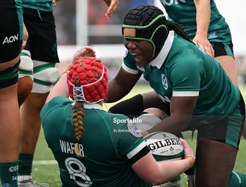 18 April 2026; Aoife Wafer of Ireland celebrates with teammate Linda Djougang after scoring their side's second try during the Women's Six Nations Rugby Championship match between Ireland and Italy at Dexcom Stadium in Galway. Photo by Brendan Moran/Sportsfile