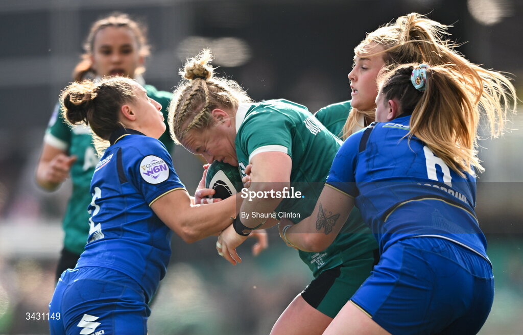 18 April 2026; Cliodhna Moloney MacDonald of Ireland is tackled by Sara Mannini and Francesca Sgorbini of Italy during the Women's Six Nations Rugby Championship match between Ireland and Italy at Dexcom Stadium in Galway. Photo by Shauna Clinton/Sportsfile