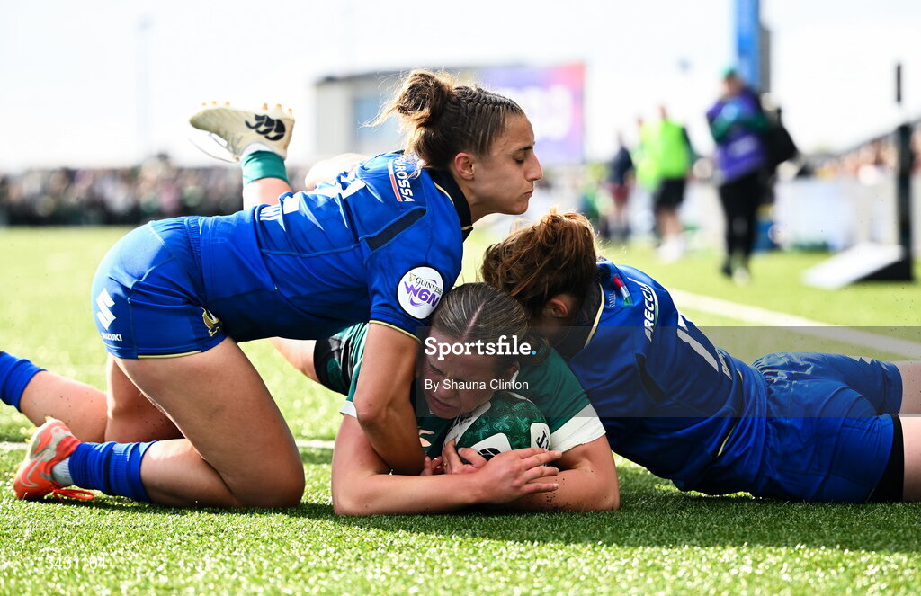 18 April 2026; Robyn O'Connor of Ireland scores her side's fourth try despite the efforts of Sara Mannini, left, and Gaia Buso of Italy during the Women's Six Nations Rugby Championship match between Ireland and Italy at Dexcom Stadium in Galway. Photo by Shauna Clinton/Sportsfile