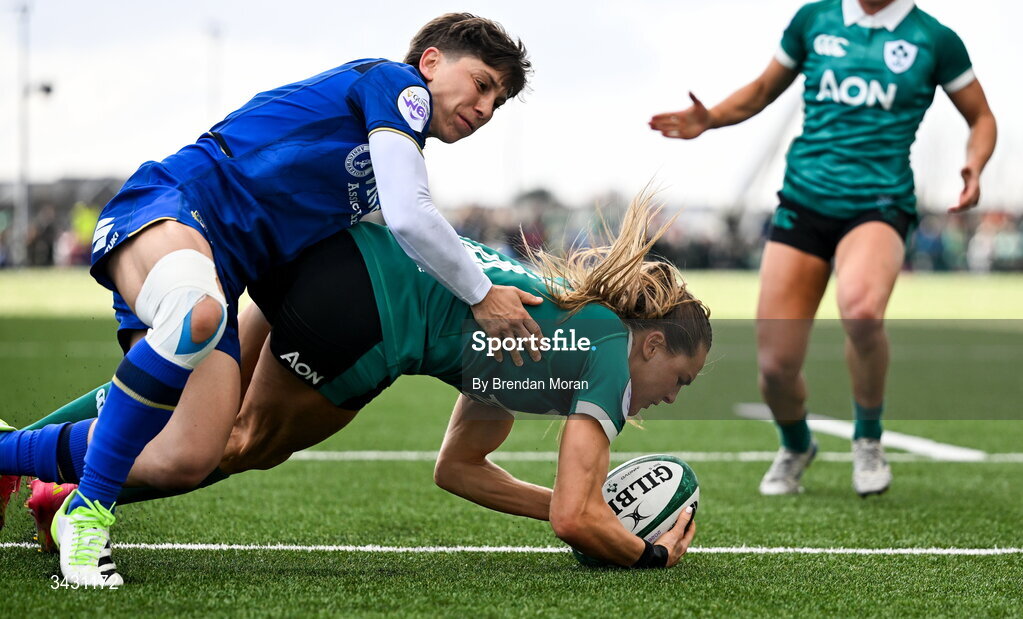 18 April 2026; Béibhinn Parsons of Ireland scores her second try despite the tackle of Sofia Stefan of Italy during the Women's Six Nations Rugby Championship match between Ireland and Italy at Dexcom Stadium in Galway. Photo by Brendan Moran/Sportsfile