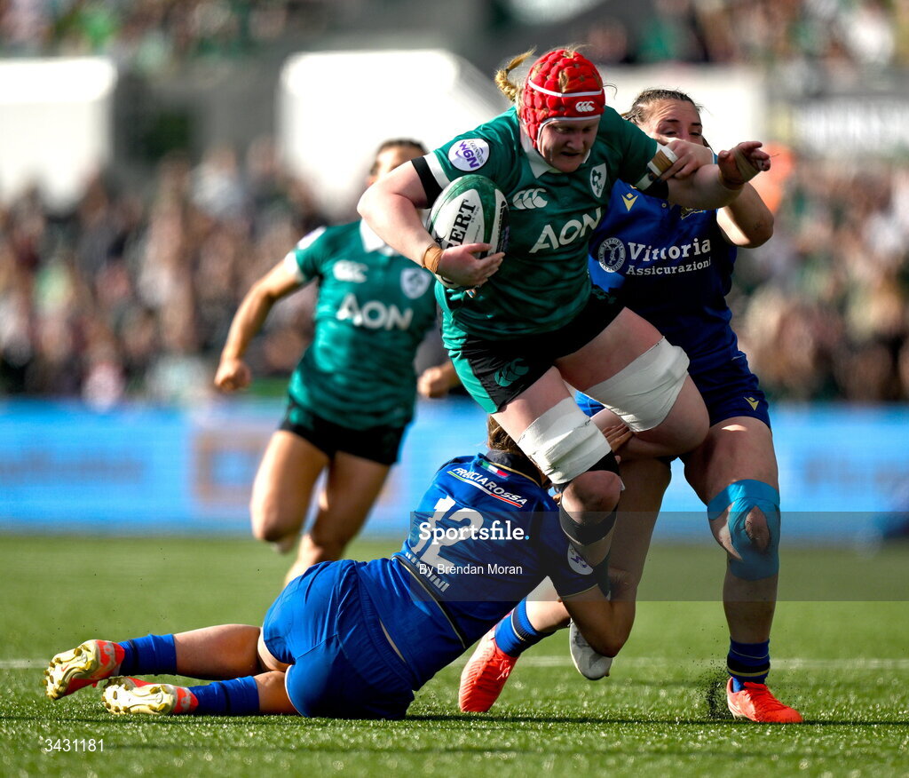 18 April 2026; Aoife Wafer of Ireland is tackled by Sara Mannini of Italy during the Women's Six Nations Rugby Championship match between Ireland and Italy at Dexcom Stadium in Galway. Photo by Brendan Moran/Sportsfile