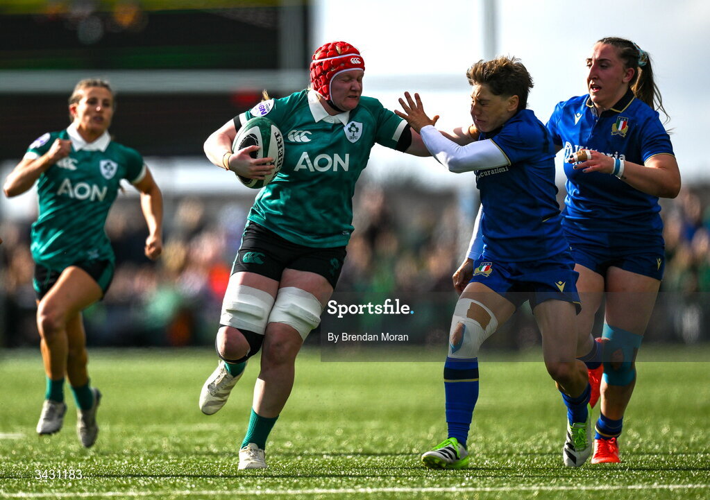 18 April 2026; Aoife Wafer of Ireland holds off the tackle of Sofia Stefan of Italy during the Women's Six Nations Rugby Championship match between Ireland and Italy at Dexcom Stadium in Galway. Photo by Brendan Moran/Sportsfile