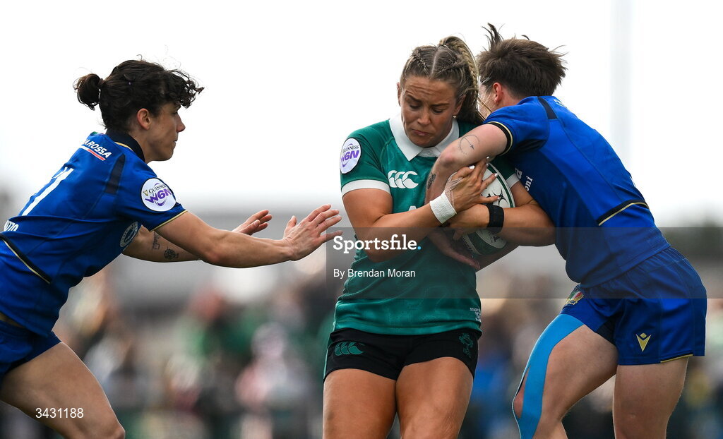 18 April 2026; Stacey Flood of Ireland is tackled by Aura Muzzo and Alyssa D'Inca of Italy during the Women's Six Nations Rugby Championship match between Ireland and Italy at Dexcom Stadium in Galway. Photo by Brendan Moran/Sportsfile