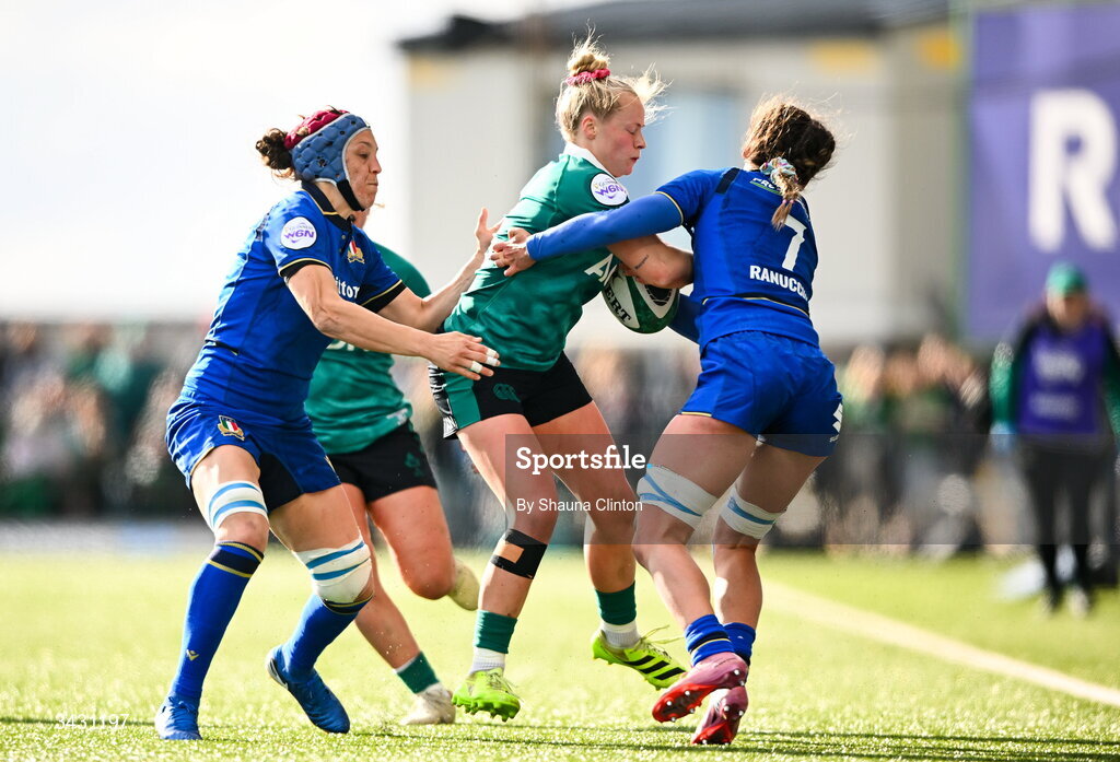 18 April 2026; Dannah O'Brien of Ireland is tackled by Elisa Giordano, left, and Alissa Ranuccini of Italy during the Women's Six Nations Rugby Championship match between Ireland and Italy at Dexcom Stadium in Galway. Photo by Shauna Clinton/Sportsfile