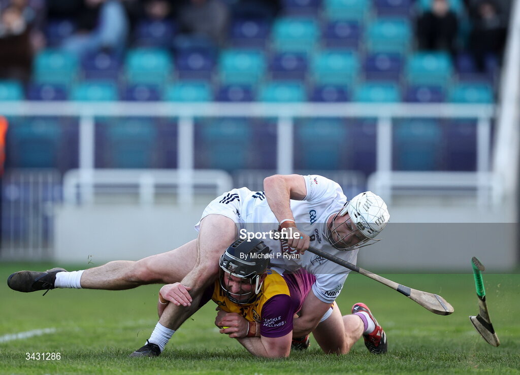 18 April 2026; Kevin Foley of Wexford is tackled by Conan Boran of Kildare during the Leinster GAA Senior Hurling Championship Round 1 match between Kildare and Wexford at Cedral St Conleth's Park in Newbridge, Kildare. Photo by Michael P Ryan/Sportsfile