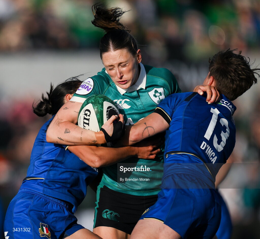 18 April 2026; Anna McGann of Ireland is tackled by Alia Bitonci, left, and Alyssa D'Inca of Italy during the Women's Six Nations Rugby Championship match between Ireland and Italy at Dexcom Stadium in Galway. Photo by Brendan Moran/Sportsfile