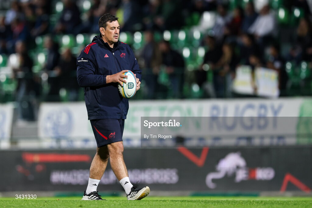 18 April 2026; Munster head coach Clayton McMillan walks across the pitch during the warm up ahead of the United Rugby Championship match between Benetton and Munster at Stadio Monigo in Treviso, Italy. Photo by Tim Rogers/Sportsfile