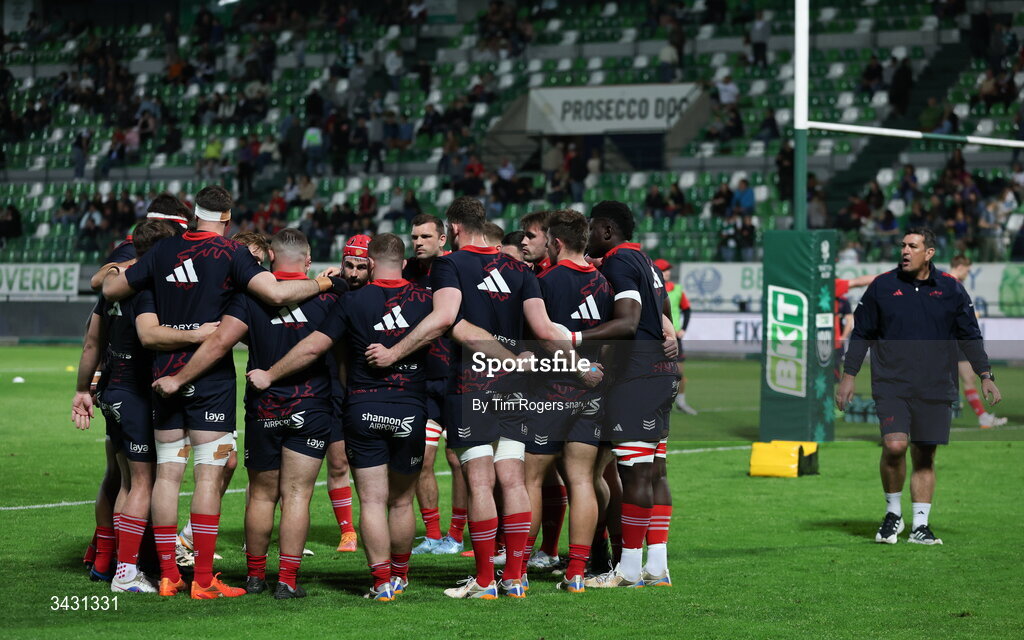 18 April 2026; The Munster players huddle before the United Rugby Championship match between Benetton and Munster at Stadio Monigo in Treviso, Italy. Photo by Tim Rogers/Sportsfile